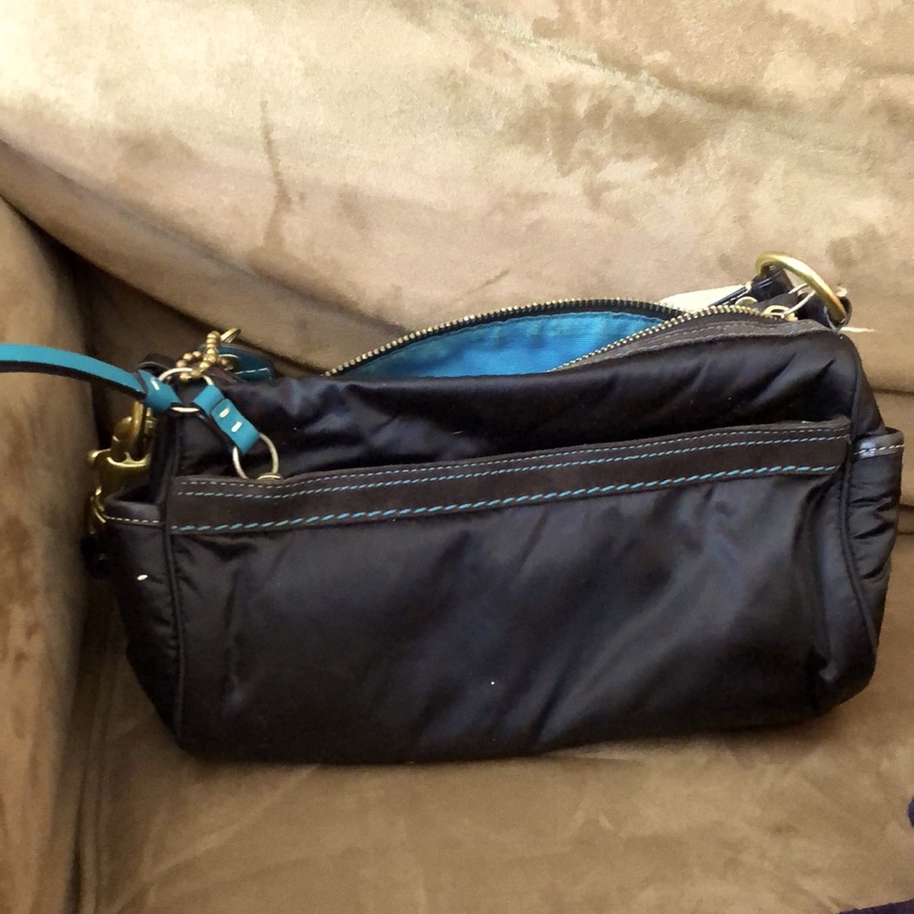 Black Coach purse with turquoise details
